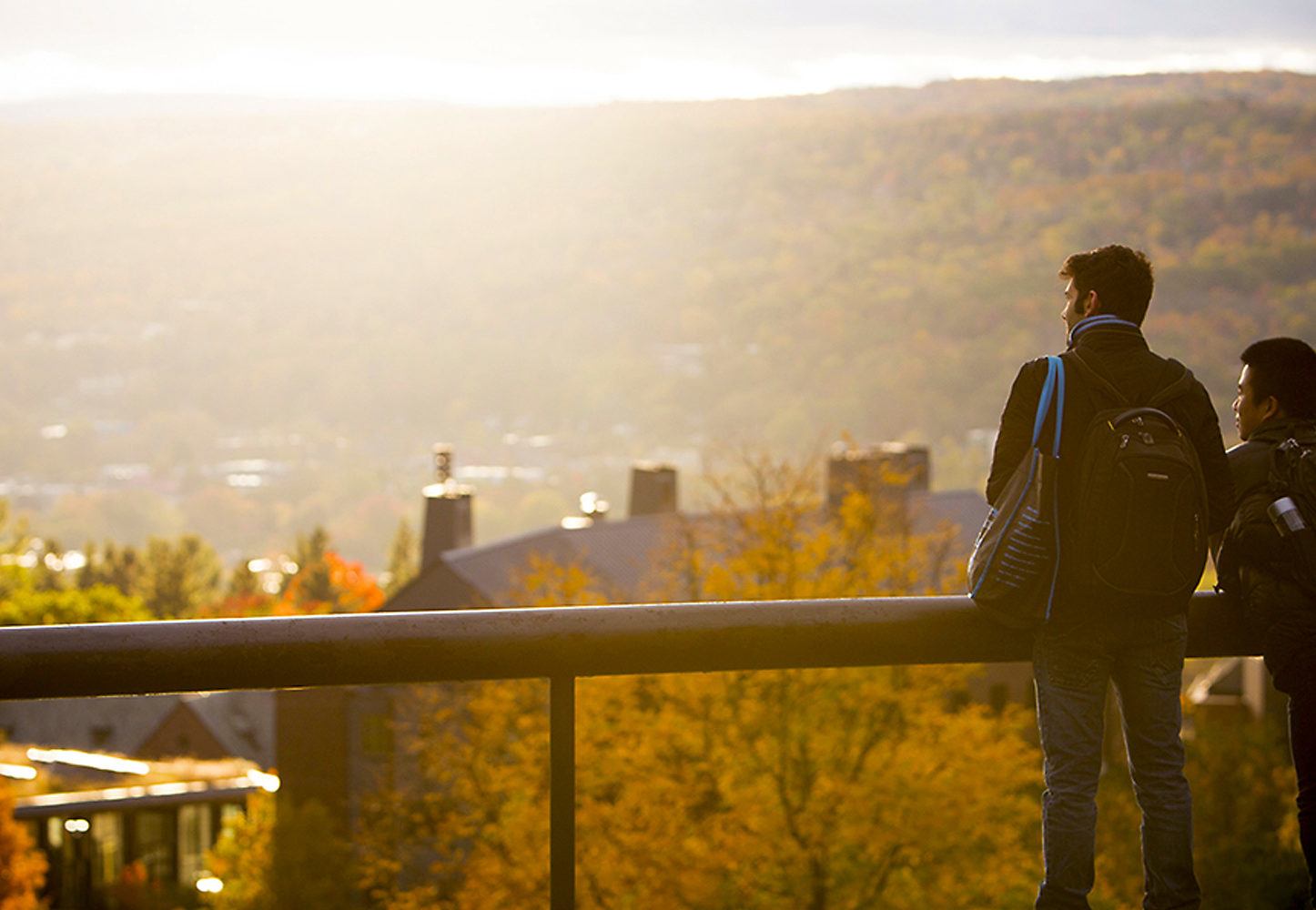 Students look over West Campus in fall.