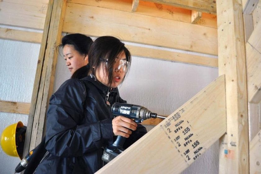 Alternative Break students building a barn