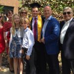 Members of the Gancas family celebrate a 2014 graduation