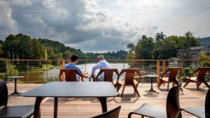 The Treman Family Terrace at the Martin Y. Tang Welcome Center provides sweeping views of Beebe Lake, portions of the Cornell Botanic Gardens, and campus.