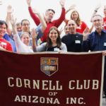 Members of the Cornell Club of Arizona with a banner
