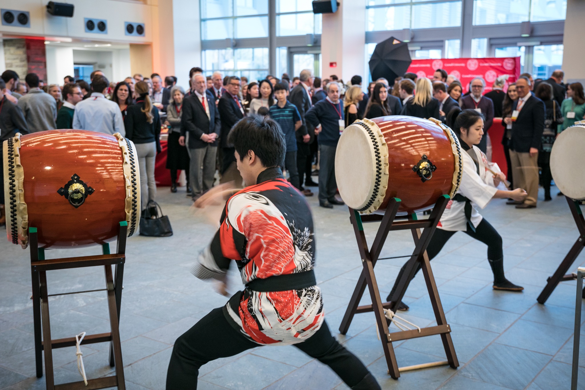 A drummer hits a drum.