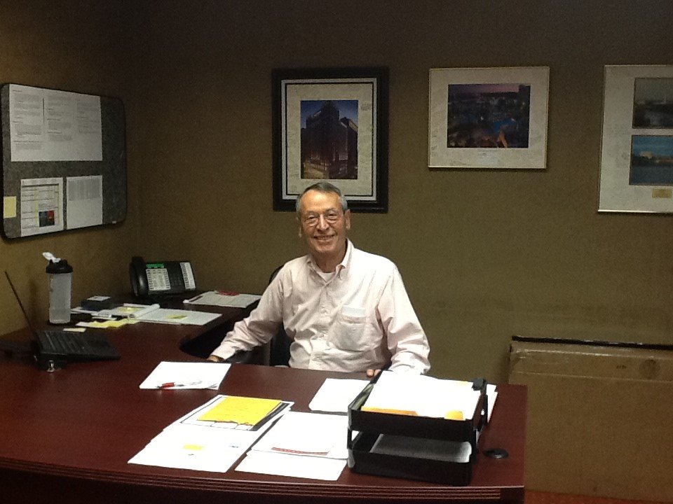 Androulakis at his desk at the Marriott in Kansas City, where he worked as general manager.