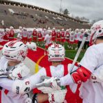 The 2019 men's lacrosse team in a circle