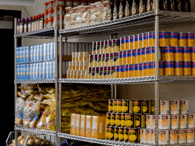 Canned goods stacked on shelves