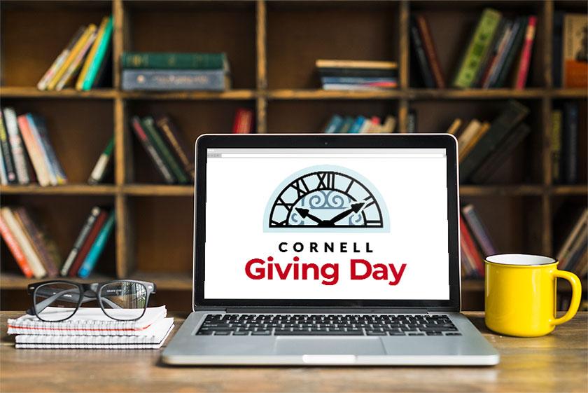 Laptop with Giving Day logo