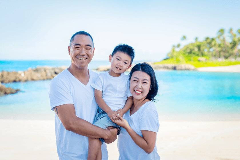 Will Yoon ’01, Renee Choi ’06, and their son Liam.