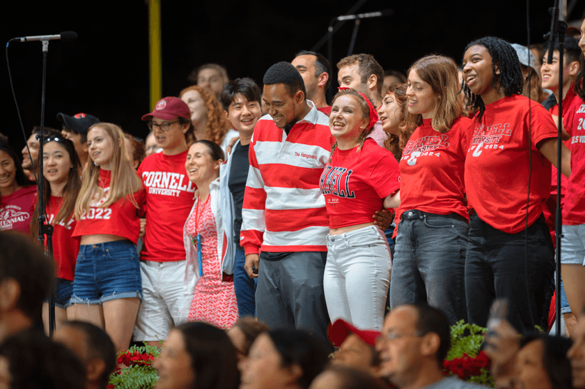 Students and alumni join in song at Cornelliana Night