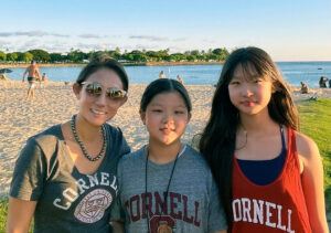 Michell and her two daughters, Leia and Kailani (potential candidates for the classes of 2034 and 2033, respectively), at home in Hawaiʻi