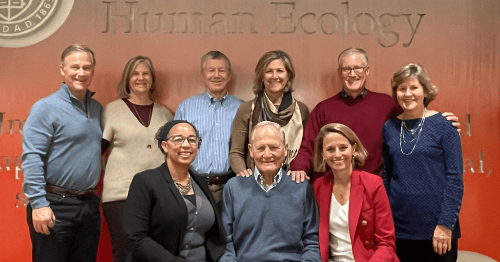 group photo of follett family and faculty