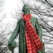 Ezra statue wearing a scarf