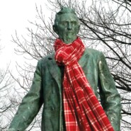 Ezra statue wearing a scarf