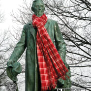 Ezra statue wearing a scarf