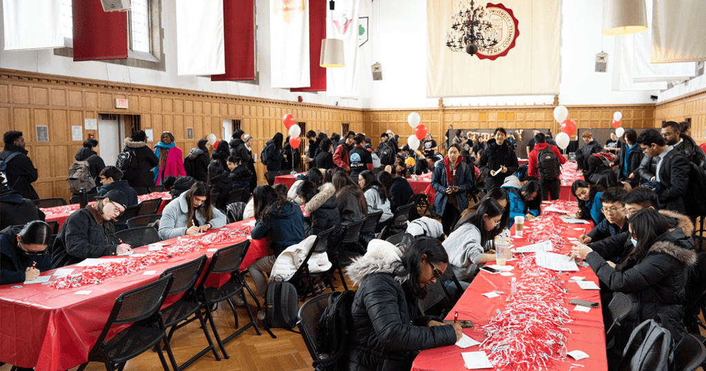 Students and staff attend a university-wide Giving Day celebration at Willard Straight Hall