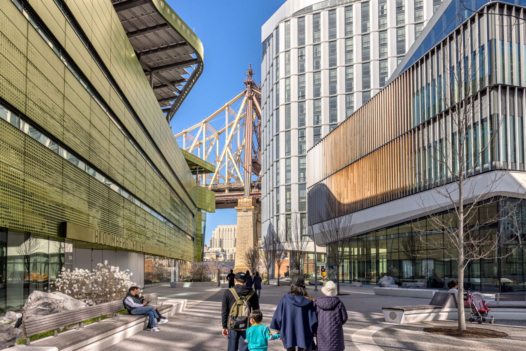 Visitors walk through the Cornell Tech campus