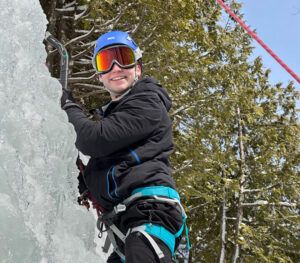Daniel Morgan enjoying ice climbing through Cornell Outdoor Education in February 2023
