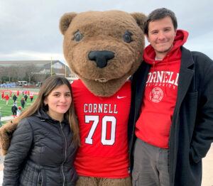 Patrick J. Mehler with Touchdown and Julia E. Risi ’23, JD ’25 at the last football game of the 2022 season at Schoellkopf