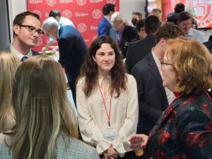 SCC eboard members Abigail Boatmun and Luke Denver-Moore chatting with Cornell Annual Funds National Chair Mary Meduski ’80, P ’18 at the Annual Fund kickoff event in New York City