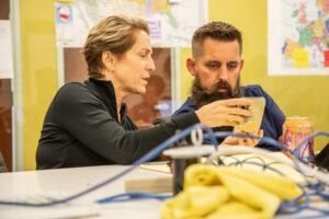 Nell working with Brian Peck (Marine Corp, Afghanistan, veteran) in the Evacuate Our Allies Operations Center, which she helped establish in August 2021