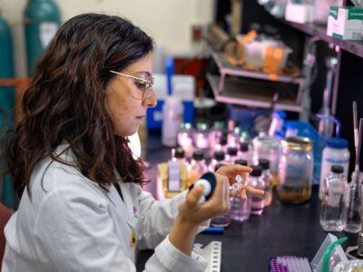 Lígia Fonseca Coelho, a Fulbright postdoctoral researcher in astronomy in the College of Arts and Sciences, works in her lab in Wing Hall.