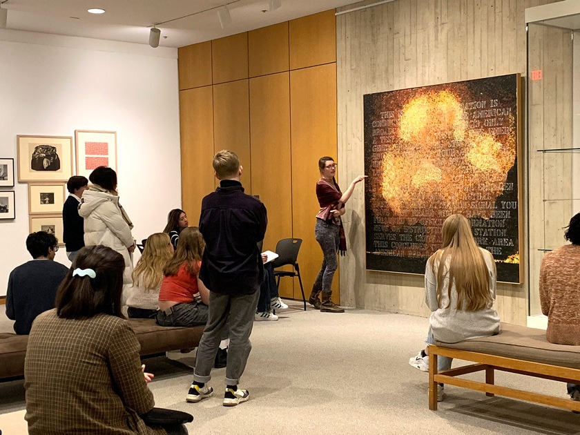 For a spring 2024 “Humanities Scholars Research Methods” course, Alison Rittershaus, Lynch Postdoctoral Associate in Curricular Engagement, uses “Early Warning,” a 1984 acrylic on canvas by American artist David R. Smyth, installed in the Richard Sukenik ’59 Teaching Gallery at the Johnson Museum.