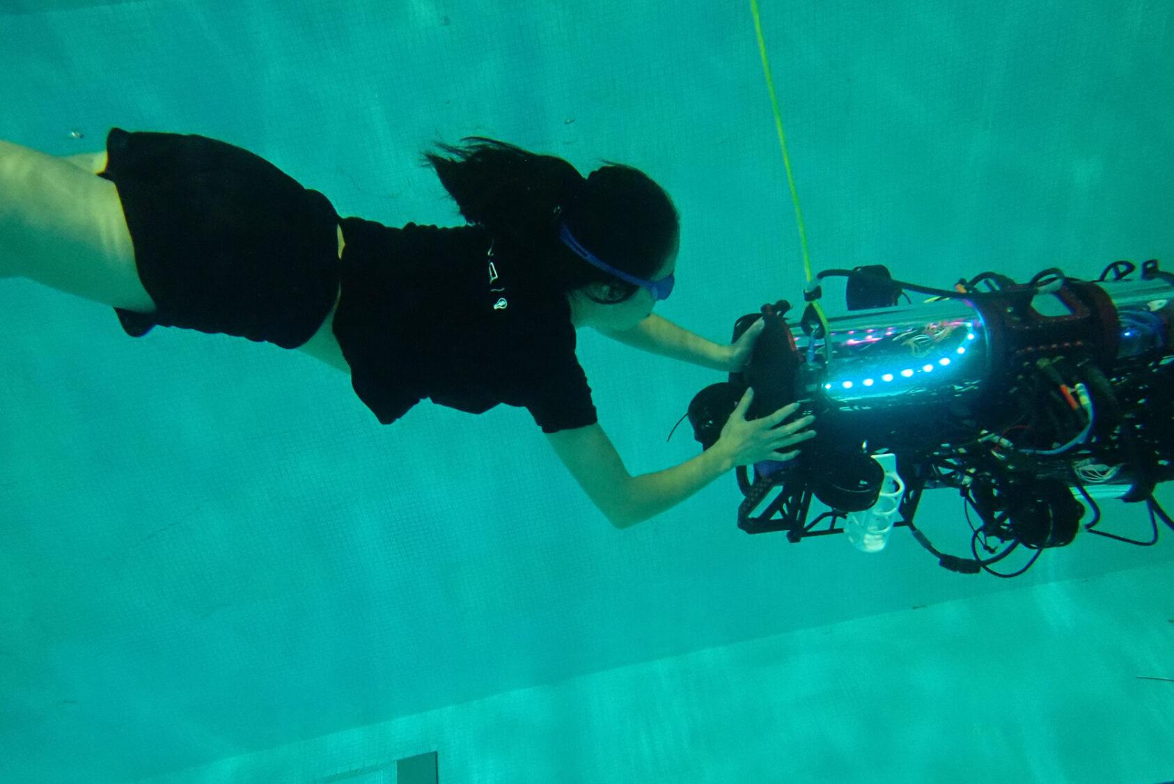 The Cornell University Autonomous Underwater Vehicle student project team testing “Polaris”—the team’s 2023 sub—in Teagle Hall swimming pool.