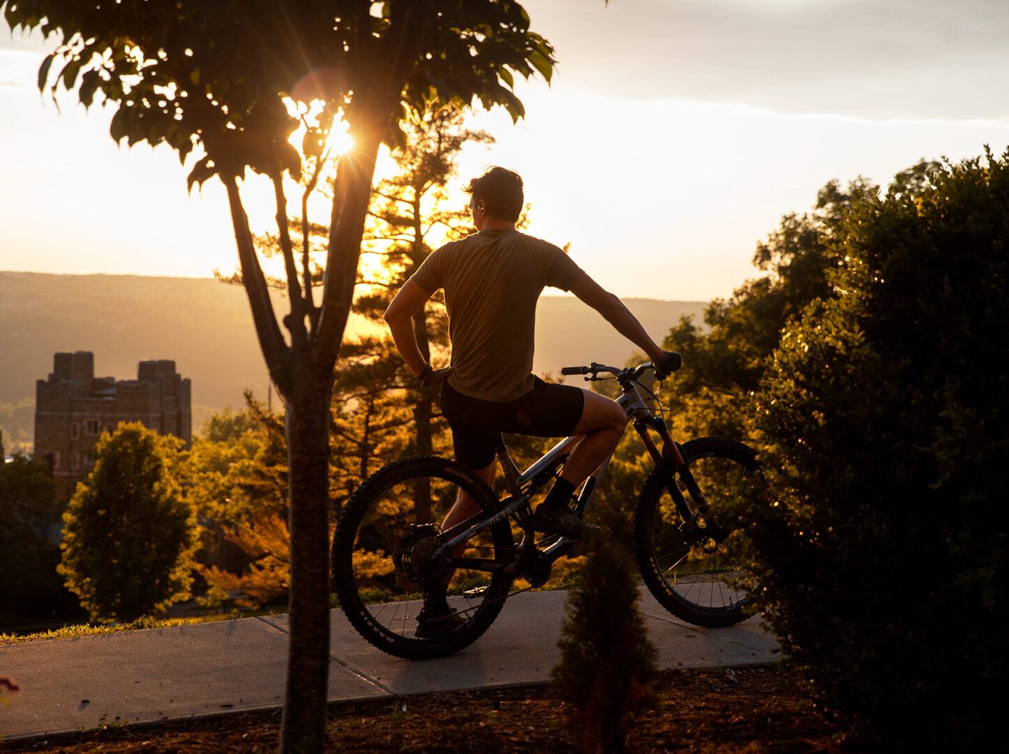 A cyclist taking in the views at Libe Slope.