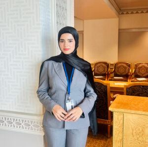 Mursal stands outside a meeting room at the UN headquarters in NYC, where she worked as an intern with the United Nations Dispute Tribunal in summer 2024.