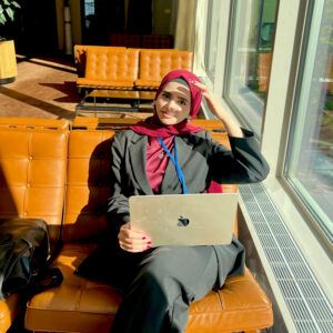 Mursal enjoys a sunny day in NYC, sitting by a window at the UN headquarters in NYC.