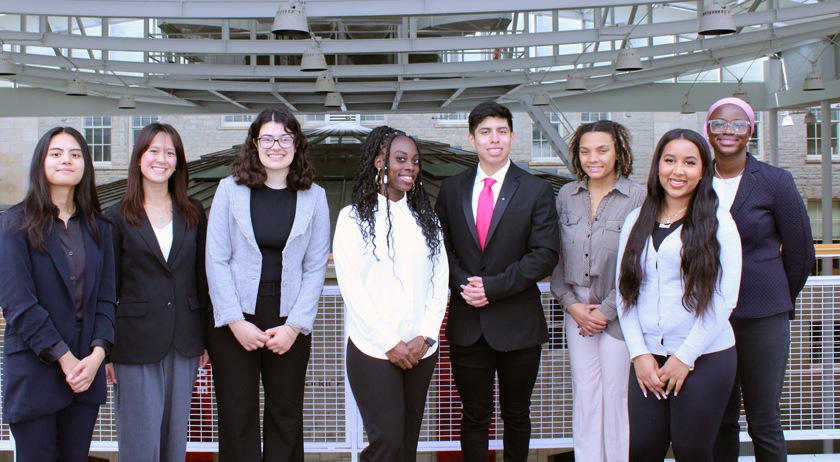 Cornell University's Diversity Admissions Ambassadors executive board members pose for a photo in Klarman Hall in September 2024.