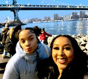 Vianny (right) and Nairoby Pena ’25 enjoy a visit to New York City.