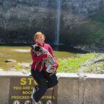 Katherine DeRose ’26 and her dog Ruby visit Taughannock Falls in fall 2024.