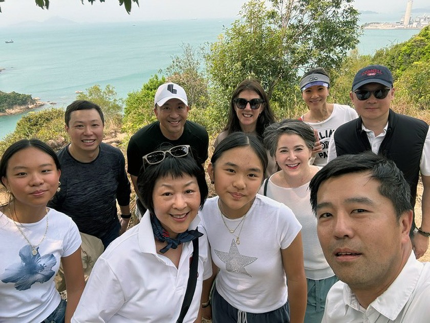 Cornellians enjoy a day hike in Hong Kong. Back row: Annabelle Sun, Isaac Wong '00, Bryant Lu '98, Wendy Wolford (vice provost for international affairs), Jacqueline Sun, Julian Liu '94. Front row: Hongnan Ma (director of international development, Asia), Colette Sun, Lisa Nishii (vice provost for undergraduate education), Stanley Sun '00.