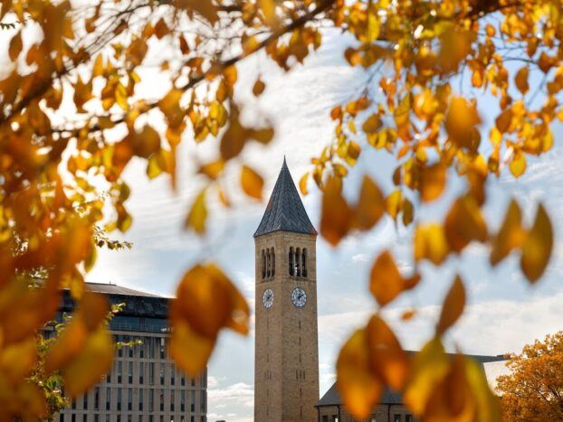 McGraw Tower surrounded by autumn foliage